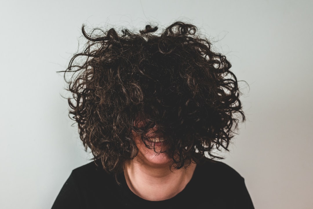 Woman with frizzy, textured curly hair