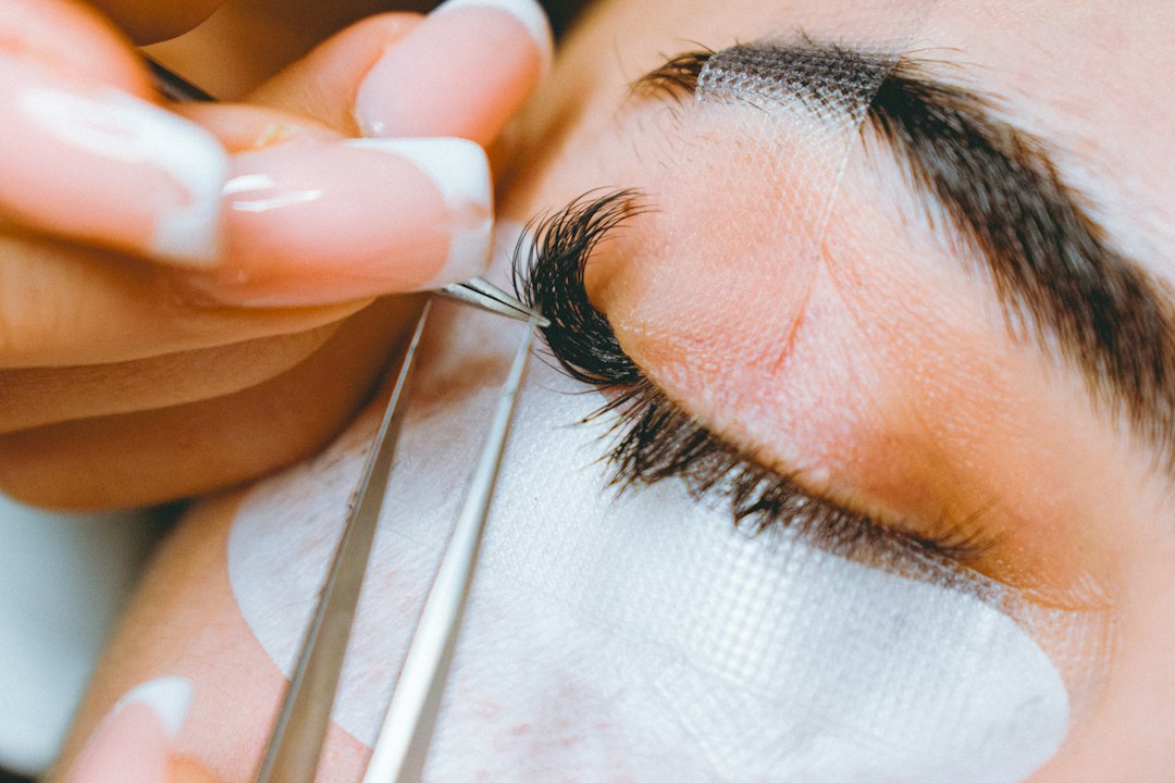 Close-up of a lash lift treatment being applied to natural lashes