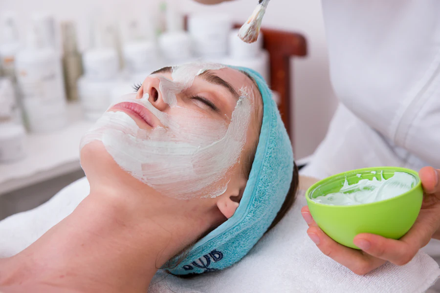 Woman wearing a facial mask during a skincare treatment