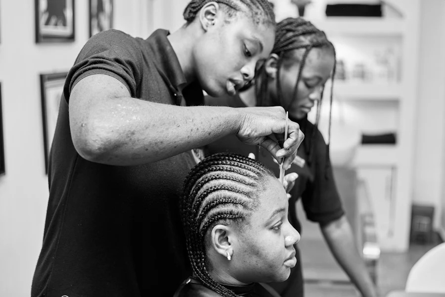 Client getting a keratin hair smoothing treatment at a salon